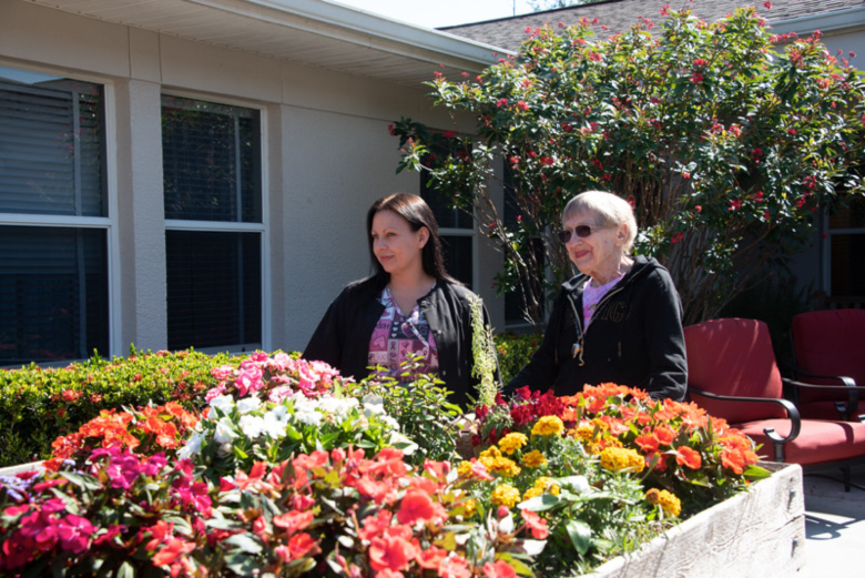 dementia care at autumn house, looking at flowers